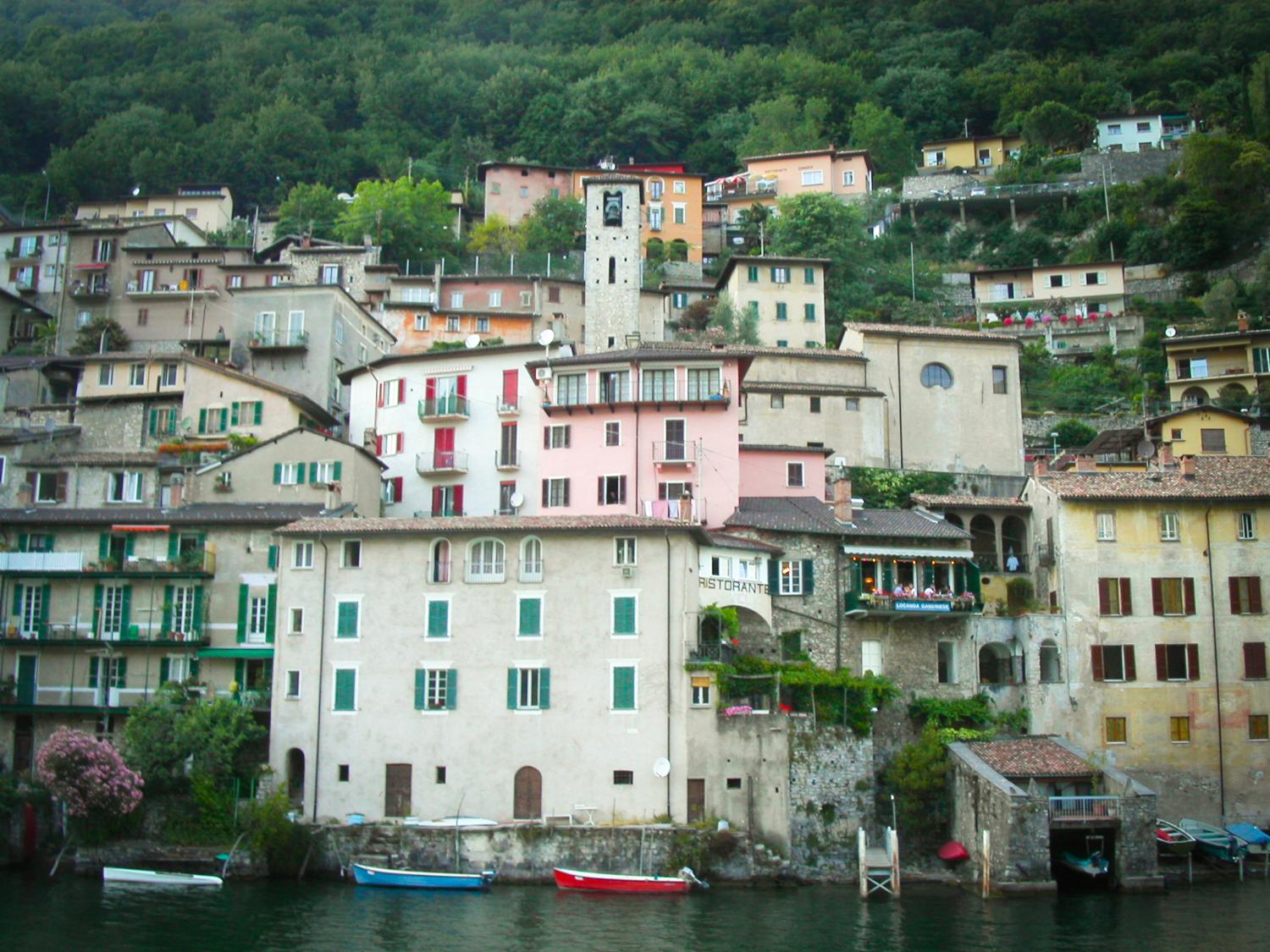 Lake Lugano is a glacial lake at the border between Switzerland and Italy. At 49 sq km (19 sq mi) and an average width of approximately one kilometer (over half a mile), roughly 60% of the lake lies in Switzerland, the rest in Italy. 