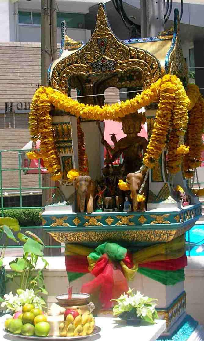 A spirit house in front of the Chateau de Bangkok Hotel.