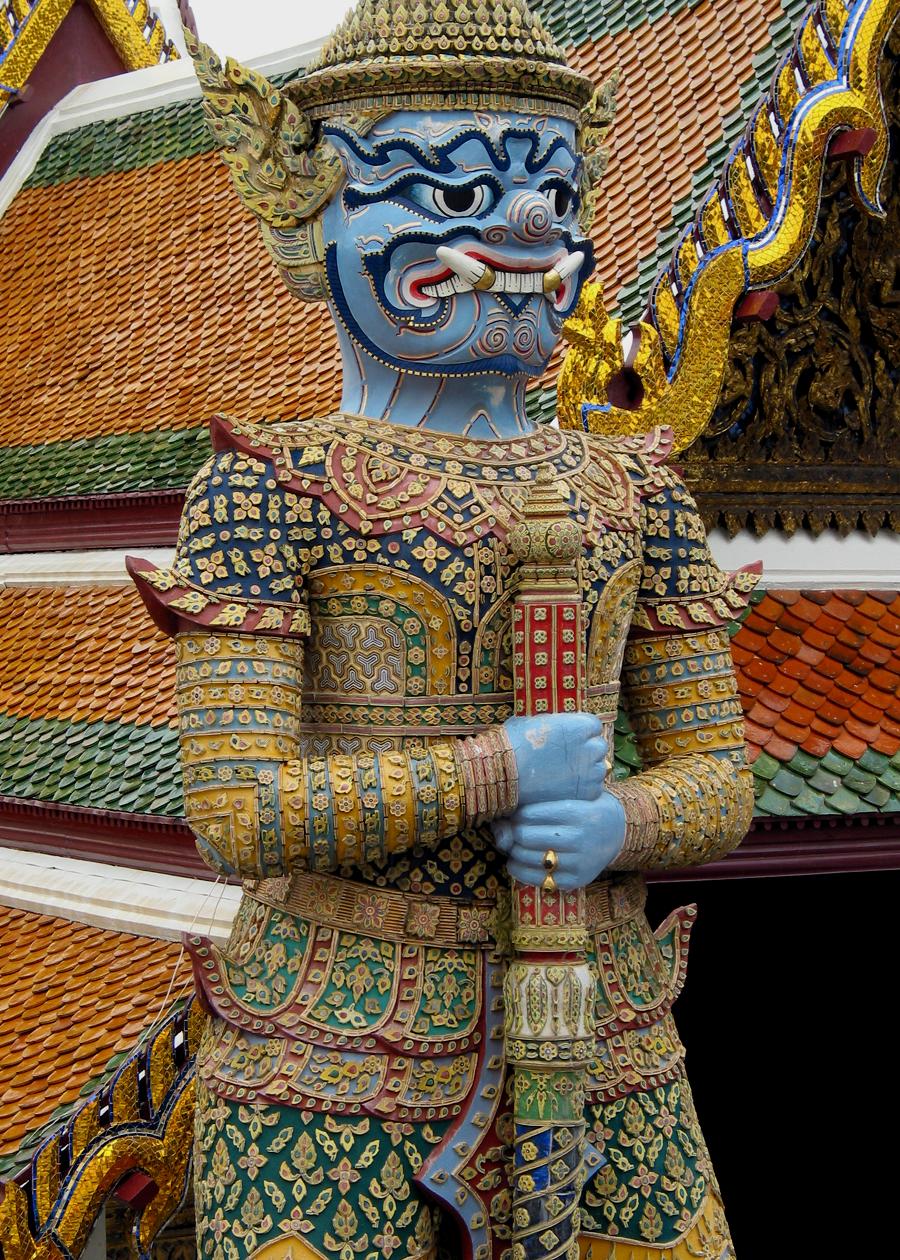 A Yaksha demon guards the Wat Phra Kaew (Temple of the Emerald Buddha) in the Grand Palace in Bangkok.