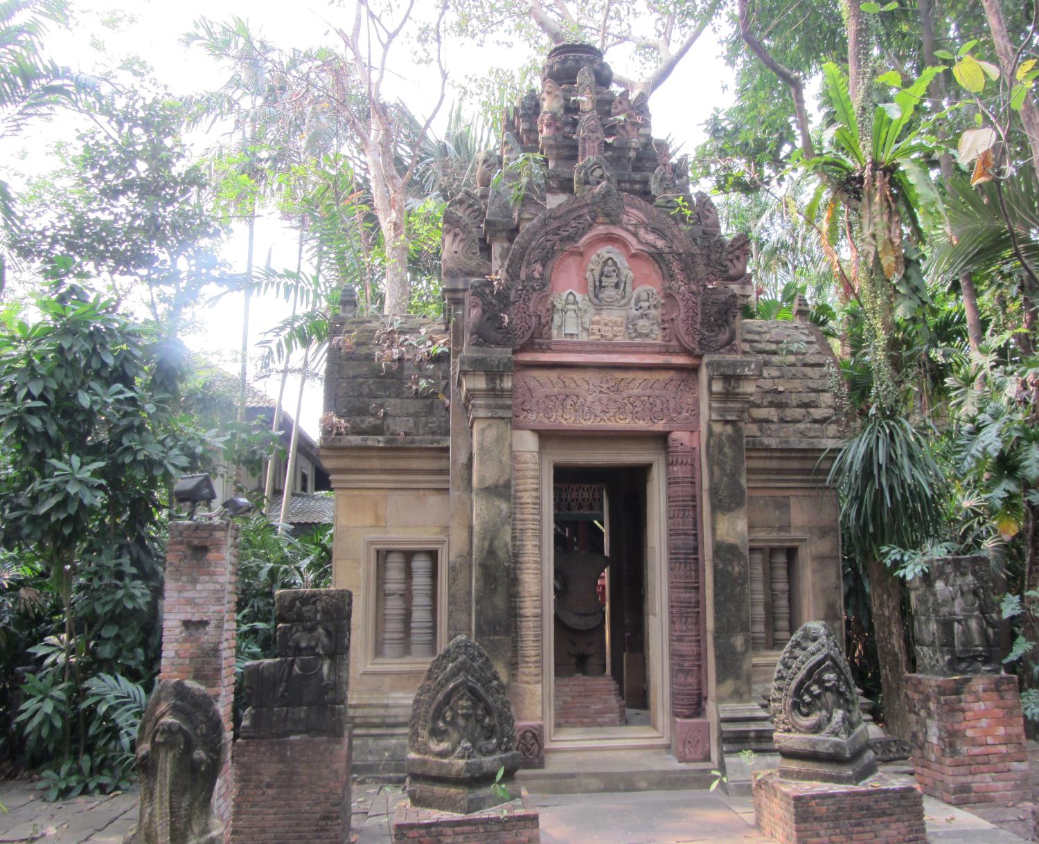 A chapel in the Burmese style in the Garden of Serenity on the grounds of the Prasart Museum in Bangkok. 
