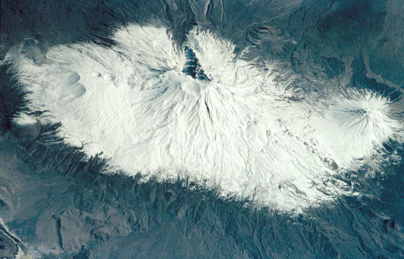 Mount Ararat (5,166 m, 16,949 ft) is the largest volcano in Turkey, but is not currently active. It is located in extreme northeastern Turkey, near the borders with Iran and Armenia. Southwest of the main peak lies Lesser Ararat (3,896 m, 12,877 ft). Ahora Gorge is a northeast-trending chasm dropping from the top of the mountain. Claims by different explorers to have found remnants of Noah's Ark on Mount Ararat have led to continuing expeditions to the mountain, many focusing their searches on the gorge area. Photo courtesy of NASA.