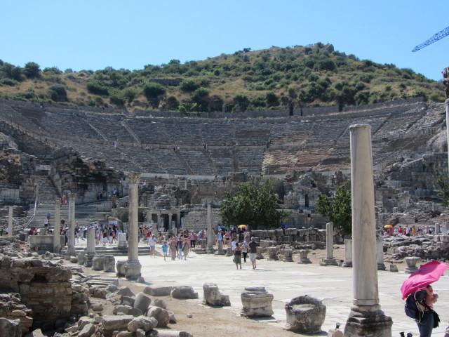 The Great Theater in Ephesus was based on an original Greek structure. In the Roman period, it was expanded under the reigns of Domitian (A.D. 81 to 96) and Trajan (98 to 117). One estimate gives the theater's capacity as 44,000 spectators and as such it would have been the largest in the ancient world. While generally used for theatrical performances and public assemblies, it was also used for gladiatorial contests in the later imperial period.