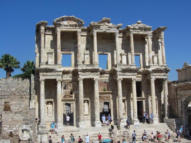 The Library of Celsus in Ephesus was built between A.D. 100 and 110 by Gaius Julius Aquila in memory of his father, Tiberius Julius Celsus Polemaneanus, a former governor of Roman Asia, who is buried under the library. The library held 1,200 scrolls and was built facing east to make the best use of morning light; it was destroyed by an earthquake in A.D. 270. The facade was reconstructed between 1970 to 1978.