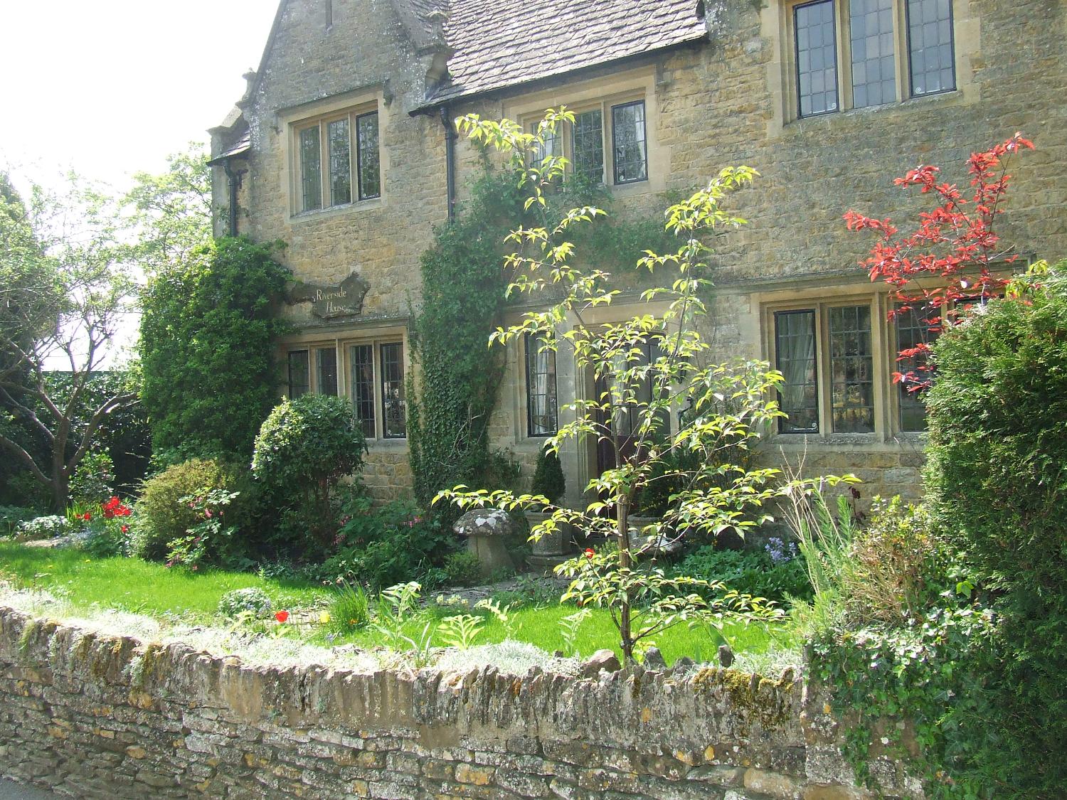 An inviting cottage in the town of Bournton-on-the-Water, Cotswolds district, England.
