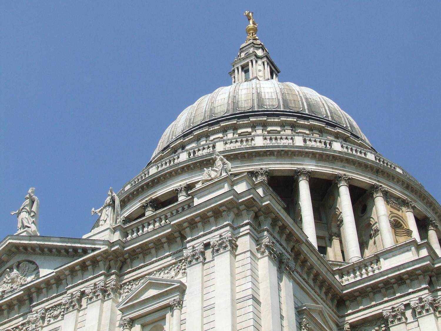 Looking up at the dome of St. Paul's Cathedral in London. This Anglican place of worship rests on Ludgate Hill, the highest point in the city. The present building - designed by Sir Christopher Wren - dates to the 17th century and is generally considered to be the fifth St. Paul's erected on the site.
