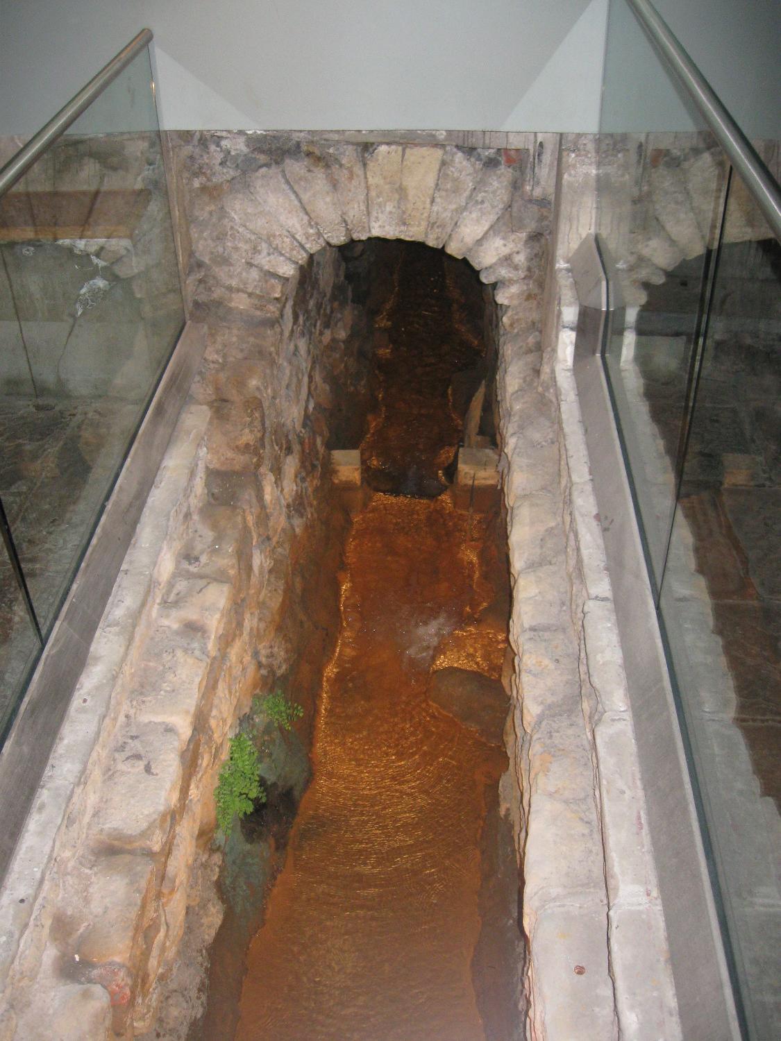 Hot water (46 degrees C or 115 degrees F) continues to flow into the Great Bath at Aquae Sulis through the original Roman channels.