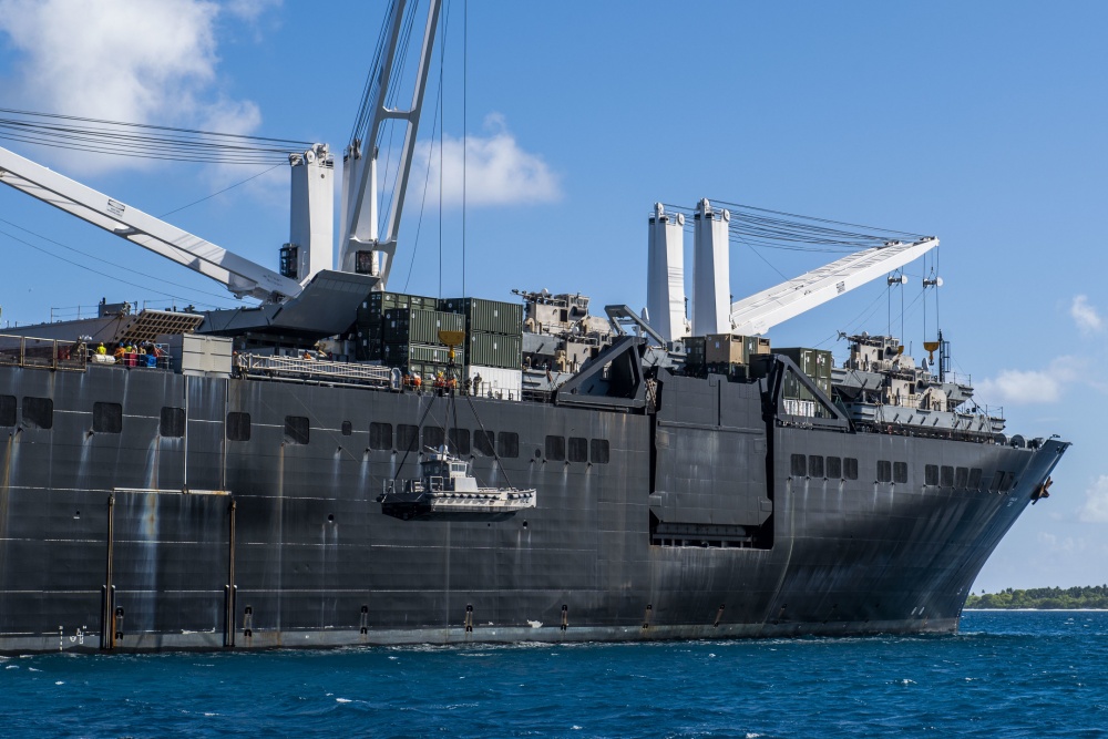 The USNS Seay (T-AKR 302), a Military Sealift Command roll-on roll-off vehicle cargo ship,  at anchor in the lagoon at Diego Garcia. The photo shows sailors lowering a maritime prepositioning force utility boat from the USNS Seay using a crane during a ship-to-shore logistics training exercise.  Diego Garcia provides critical logistical infrastructure support to US and Allied Forces forward deployed to the Indian Ocean and Arabian Gulf. Photo courtesy of the US Navy/ Mass Communication Specialist 1st Class Nathan Carpenter.