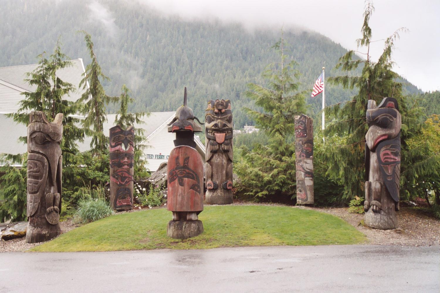 "Clan Council" totem pole arrangement atop Cape Fox Hill, Ketchikan, Alaska.