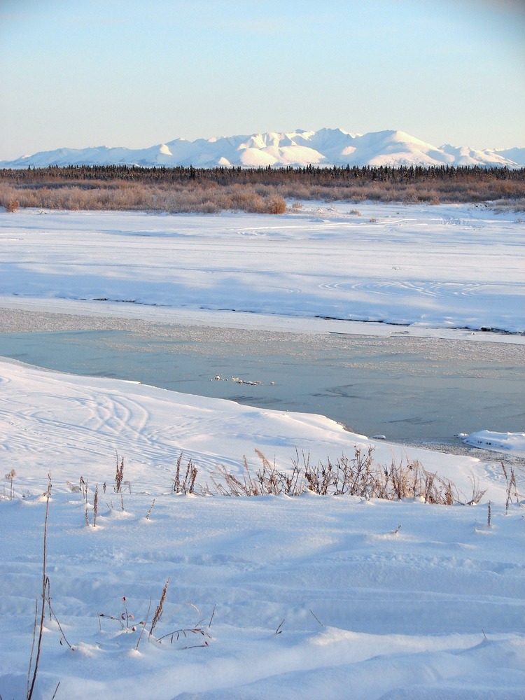 Winter in the Lower Noatak Basin. In November there is still enough sunshine to capture the shadows and bright white of snow and ice on the landscape in Noatak National Preserve, Alaska. Photo courtesy of the US National Park Service.