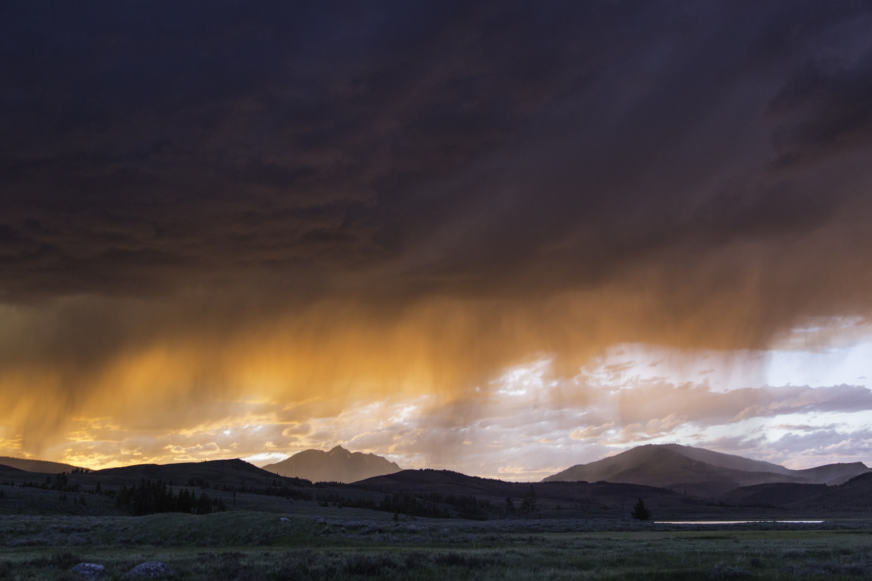 A thunderstorm at sunset at Swan Lake Flat in Yellowstone National Park. Image courtesy of the US National Park Service/Neal Herbert.