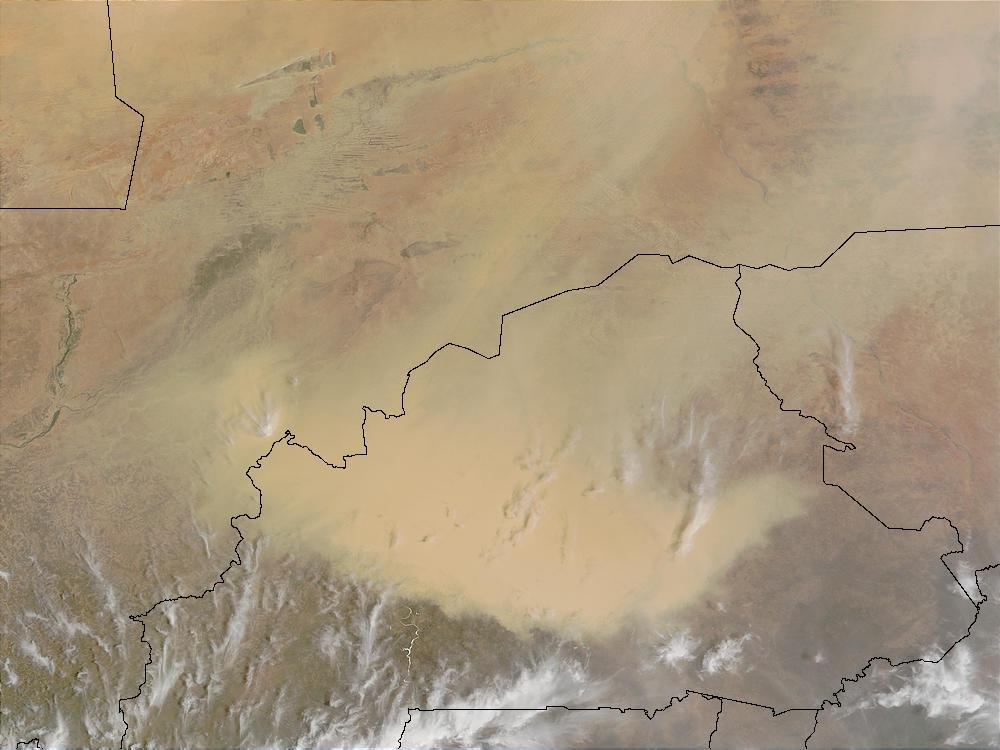 A massive dust storm in Burkina Faso (bottom center) created an opaque, sandy shroud over much of the landlocked West African country. The storm seems to be extending north into Mali and east into southwestern Niger. Image courtesy of NASA.
