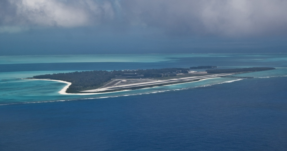 Oblique view of Midway Atoll. The Battle of Midway, fought over and near the Midway Atoll, approximately 2,800 km (1,500 nautical mi) northwest of Hawaii, represents a turning point in the Pacific Theater of World War II. Photo courtesy of the US Navy/ Petty Officer 2nd Class Mark Logico.