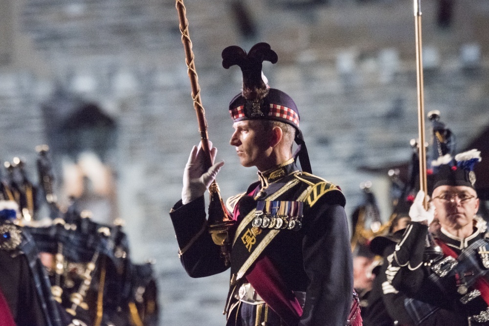 The 1st Battalion Scots Guard Pipes and Drums, along with the Royal Highland Fusilers, 2nd Battalion the Royal Regiment of Scotland perform during the Royal Edinburgh Military Tattoo held at Edinburgh Castle, Scotland, 25 August 2017. This year performers from 50 countries have taken part in the Tattoo, including the US Navy Band. Photo courtesy of the US Navy/ Petty Officer 1st Class Dominique A. Pineiro.