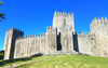 The castle in Guimaraes was built in the 10th century to protect a nearby monastery from Moors and Norsemen.  As the first capital of the nation and birthplace of its first king, Guimaraes it is one of Portugal's most historic cities  and one of the most attractive places to visit in the country. Its historic town center is listed as a World Heritage Site in recognition of its being an "exceptionally well-preserved and authentic example of the evolution of a medieval settlement into a modern town" in Europe. 
