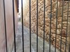 Contrasting walls. The wall on the right belongs to one of the palaces in the Alcazaba in Malaga.