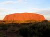 Uluru / Ayers Rock is an inselberg, or island mountain, found in the Northern Territory near Alice Springs - in the middle of Australia's Outback.  It is a large sandstone rock formation that the aborigines of the area hold sacred.  