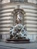 The fountain, Power at Sea, one of two that grace the front of the Michaelertrakt (Michael's Wing) of the Hofburg (Imperial Palace) in Vienna. 