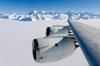 NASA's DC-8 flying laboratory passes Antarctica&amp;apos;s tallest peak, Vinson Massif, on 22 October 2012, during a flight over the continent to measure changes in the massive ice sheet and sea ice. The flight was part of NASA&amp;apos;s Operation IceBridge, a multi-year airborne campaign to monitor changes in Earth&amp;apos;s polar ice caps in both the Antarctic and Arctic. Vinson Massif is located in the Sentinel Range of the Ellsworth Mountains in Antarctica. Photo courtesy of NASA/Michael Studinger.

