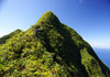 Located on one side of Pago Pago Harbor, Matafao Peak is one of five great masses of volcanic rock that were extruded as molten magma during the major episodes of volcanism that created Tutuila island. Matafao Peak is the highest mountain on the island. Shown is the peak of Matafao Peak. Photo courtesy of the US National Park Service.