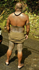 Pe'a is the name of the traditional male tattoo of Samoa. The pe'a covers the body from waist to the knees. The tattoo starts on the back and finishes on the belly button. Overall, the design is symmetrical with a pattern consisting mainly of straight lines and larger blocks of dark cover, usually around the thighs. Photo courtesy of the US National Park Service/ Cathy Johnson.