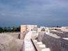 Walls of the historic Qal'at al-Bahrain (Fortress of Bahrain), which is the largest and most ancient historical site in the country. It was an important center of the Dilmun Civilization (2nd and 1st millennia B.C.); in later periods, it served as a trading and military outpost.