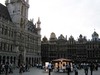 Evening view in the Grand Place/Grote Markt in Brussels; the Hotel de Ville/Stadhuis (City Hall) is on the left. 