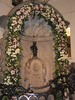 Manneken Pis is a landmark 61 cm (24 in) bronze fountain sculpture in the center of Brussels, depicting a naked little boy urinating into the fountain's basin. Erected in 1618 or 1619, the current statue is a replica that dates from 1965. The original is preserved in the Brussels City Museum. While Manneken Pis is one of the best-known attractions of Brussels, many tourists are taken aback by its small size. 