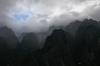 Tiger Leaping Gorge, one of the world's deepest river canyons, is located on the Yangtze River near Lijiang City, Yunnan. A local legend of a tiger that leapt across the narrowest point of the gorge gives the site its name.