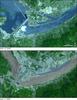 Construction of the Three Gorges Dam on the Yangtze River in central China. On 15 May 2006, Chinese engineers were pouring the last of the concrete to finish the construction of the massive dam, which is designed to provide flood control and to be the largest electricity-generating plant in the world. By 15 May 2006, the dam spanned the entire river, and a large reservoir had filled behind it to the northwest. White spray shoots through gates in the center portion of the dam. The former locks are much less prominent, and the new ones to the north appear as a linear arrangement of thin, blue rectangles. Photos courtesy of NASA.
