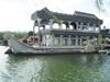 The Marble Boat at the Summer Palace in Beijing. The wooden structure was built in 1755 on a stone base and rebuilt in 1893 as a wooden lakeside pavilion in the shape of a paddle steamer. The structure is faux painted to imitate marble.