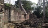 Preah Khan is a temple located northeast of Angkor Thom, it was built in the 12th century for King Jayavarman VII to honor his father. Preah Khan remains largely unrestored, with numerous trees and other vegetation growing among the ruins. 