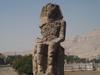 The second of a pair of 30-meter (50-ft) statues of Amenhotep III in the Theban Necropolis on the west bank of the Nile opposite Luxor. 