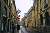 A street scene in Dijon, the capital of the Burgundy region. The city was first settled by the Romans and then became the domain of the Dukes of Burgundy, who ruled the area until the late 1400s. It is known for its many architectural styles and hosts the annual Dijon International and Gastronomic Fair. 
