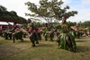 Fijians perform a traditional dance on Vanua Levu on 17 June 2015 for the crew of the hospital ship USNS Mercy (T-AH 19) as part of a ceremony during Pacific Partnership 2015. US and Fijian engineers worked together to build a new classroom at the Viani Primary School and celebrated with a ribbon cutting ceremony. Photo courtesy of the US Navy/ Chief Mass Communication Specialist Christopher E. Tucker.