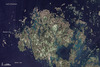 The Åland Islands (pronounced O-lahnd) lie at the southern end of the Gulf of Bothnia, between Sweden and Finland. The archipelago consists of several large islands and roughly 6,500 small isles, many of them too small for human habitation.
Åland vegetation is a combination of pine and deciduous forest, meadows, and farmed fields. 
Image courtesy of NASA/Jesse Allen & Robert Simmon, using USGS Landsat data.
