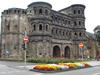 Trier was founded by the Romans no later than 16 B.C.; it eventually became the capital of the Roman province of Gallia Belgica. It is the oldest city in Germany and the oldest seat of a Christian bishop north of the Alps. The Porta Nigra (Black Gate) in Trier is the best preserved Roman city gate north of the Alps. It was built between A.D. 186 and 200 and guarded the northern entrance to the city. After 1035, the Porta Nigra was converted into a church. During the Napoleonic Wars - when Trier was occupied by the French - Napoleon ordered the Porta Nigra to be restored back to its Roman form. 
