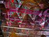 Huge incense coils hang from the ceiling of the Man Mo Temple in Hong Kong, one of the oldest and most famous temples in the city.  