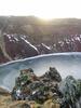 Sunset over a frozen lake-filled caldera.
