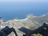 Cape Town from the top of Table Mountain with view of the ocean. 