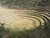 This huge series of concentric terraces in Moray (just west of the salt pans of Maras) served as an ancient agricultural research station. The distance from the highest to lowest ring is 150 m (490 ft), which allowed the Wari and later the Inca peoples to experiment with growing crops at different altitudes and exposure to the sun. The circular bottom is so well drained that it never completely floods, no matter how hard the rain. 
