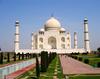 The Taj Mahal was built by Emperor Shah Jahan between 1632 and 1653 to honor the memory of his favorite wife. Located 125 miles from New Delhi in Agra, it took nearly 22 years, 22,000 workers, and 1,000 elephants to complete the white marble mausoleum. 