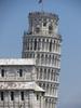 Close up of the Campanile (Bell Tower) of the Duomo (Cathedral) in Pisa. In an effort to compensate for the tilt, the medieval engineers built the upper floors with one side taller than the other. So, the tower is actually curved. Begun in 1178, the tower was not completed until 1319.
