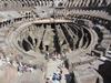 The Colosseum in Rome showing the interior with a partial reconstruction of the wooden arena floor. The rooms and passageways under the floor were used for performers, sets, and animals. The arena could be flooded to recreate sea battles.