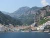 View of the city of Amalfi with Mount Cerreto (1,315 m; 4,314 ft) in the background. Amalfi was a maritime power with 70,000 residents until 1343 when an earthquake and subsequent tsunami caused most of the city and population to fall into the sea and destroyed the port. The tower of the Amalfi Cathedral (Duomo di Amalfi), built in 1208 and named Saint Andrew's Cathedral, may be seen in the foreground.