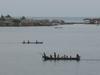 Kuna Indians rowing past their villages in the San Blas Islands of northeastern Panama. 