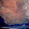 The reddish-brown Kalahari Desert with its northwest-southeast-trending sand dunes and dry lakebeds stands out in this image of South Africa. Also distinguishable are the westward-flowing Orange River, south of the true desert; the cape ranges of folded mountains near the extreme southern point of South Africa; as well as Cape Town, the Cape of Good Hope, and Cape Agulhas. Image courtesy of NASA.  