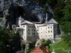 Predjama Castle in Slovenia, a large fortress built into a huge hillside cave.

