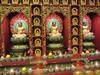 The first floor of the Buddha Tooth Relic Temple in Singapore contains the Hundred Dragons or Mitreya Hall with 100 Buddhas on both sides of the hall. The statues were individually crafted by several sculptors.