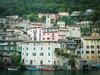 Lake Lugano is a glacial lake at the border between Switzerland and Italy. At 49 sq km (19 sq mi) and an average width of approximately one kilometer (over half a mile), roughly 60% of the lake lies in Switzerland, the rest in Italy. 