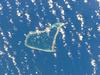 Fakaofo is one of the three islands that make up Tokelau. Its land area is only 3 sq km; the lagoon covers an area of about 45 sq km. Image courtesy of NASA. 